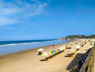 Ocean beaches of Ecuador in Montanita. Blue sky, ocean, wave and surf