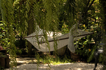 Garden setting with a rope hammock