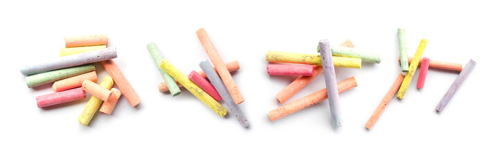 chalks in a variety of colors arranged on a white background