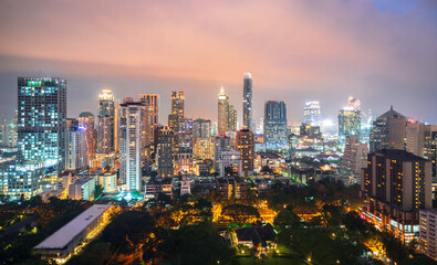 Fototapeta na wymiar Cityscape view of Bangkok modern office with sunset sky