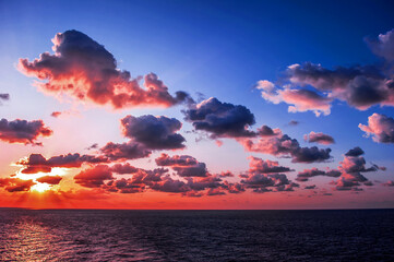 Fototapeta na wymiar The fantastic and wonderful sunset,Caribbean sea with curious clouds.