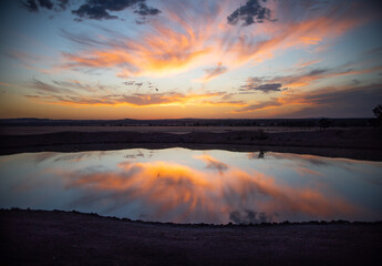 Fototapeta na wymiar Lake reflections at sunset