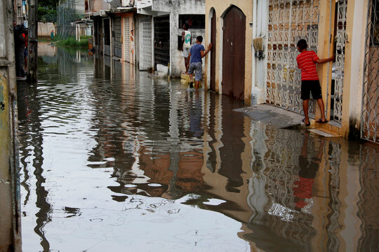 salvador, bahia / brazil - may 2, 2013: street flooded with sewage is seen in the Calcada neighborhood in the city of Salvador.