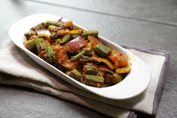 A plate of spicy and tangy Bhindi Do Pyaza or Bhindo Masala