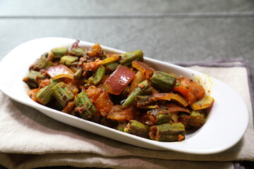 A plate of spicy and tangy Bhindi Do Pyaza or Bhindo Masala