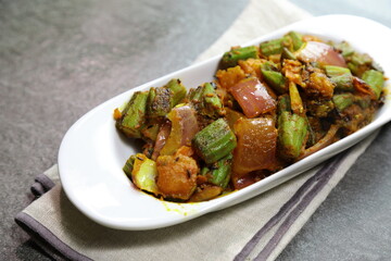 A plate of spicy and tangy Bhindi Do Pyaza or Bhindo Masala