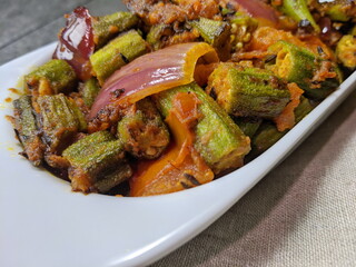 A plate of spicy and tangy Bhindi Do Pyaza or Bhindo Masala