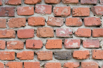 Background. A fragment of a laying of coloured bricks closeup.