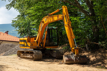 Fototapeta na wymiar excavator on the construction site