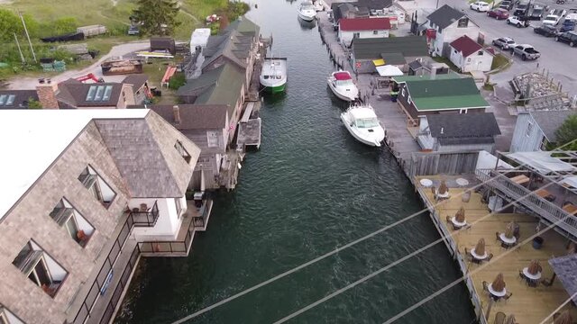 Fishtown in Leland, Michigan - A Restored Fishing Village With Shanties Filled With Shops And Restaurants - aerial