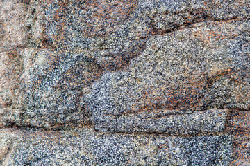gray stone texture with inclusion and homogeneous background of the rock