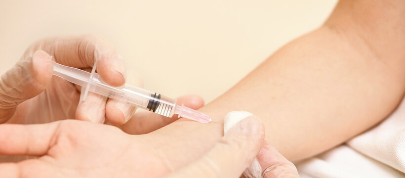 Doctor set injection to young pretty girl. Kid vaccine medical immunization. Cotton and syringe neat child arm. Medical hand. medicine pediatrician clinic. Sick baby. Horizontal banner