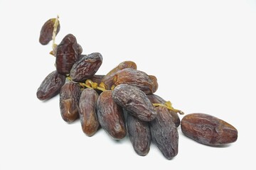 Dates or palm fruits isolated on white background 