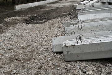 new concrete blocks and curbs for road construction