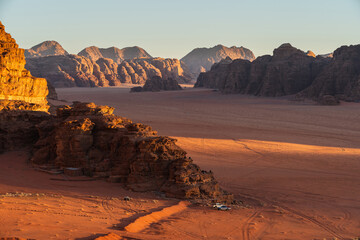 Landscape of mountains and desert in  Wadi Rum desert at beautiful evening sunset in Jordan, Middle east