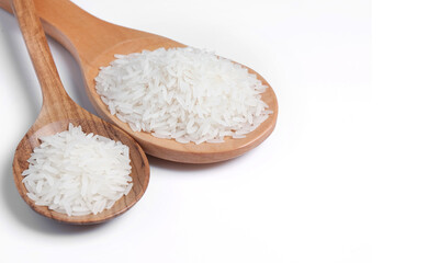 Fototapeta na wymiar Polished white rice in wooden spoon.