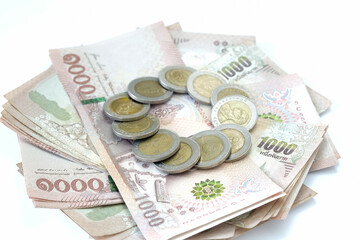 Thailand banknote and coin isolated on white background.