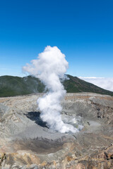 Costa Rica's Poas Volcano is blowing white smoke.