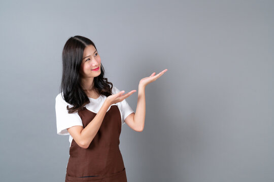 Beautiful Young Asian Woman Wearing Apron