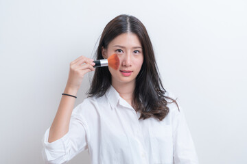 Beautiful Young Female Model Putting Blush With Cosmetic Brush