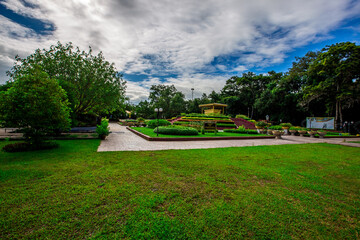 Phuttha Utthayan Wat Pa Dong Rai-Udon Thani:June 19,2020, the atmosphere inside a religious tourist site(Santi Wanaram Temple),a large lotus flower in the middle of the pool and a history in thailand.