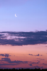 moon in the early morning and beautiful clouds at dawn