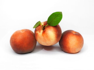 Fototapeta na wymiar Ripe peaches on white isolated background