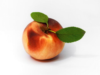 Ripe peach on white isolated background