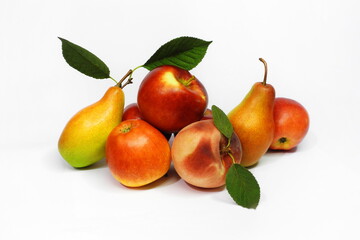 Ripe pears, apples and peaches on white isolated background
