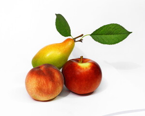 Pear, apple and peach on white isolated background