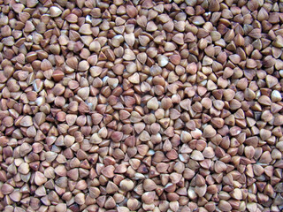 The photo shows buckwheat. Food, cooking. Close-up. Brown background