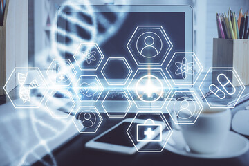 Desktop computer background and DNA drawing. Double exposure. Science concept.