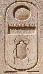 LUXOR, EGYPT - FEBRUARY 28, 2020:  Close up view of cartouche symbols on wall in Karnak temple