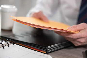 Businessman holding folder