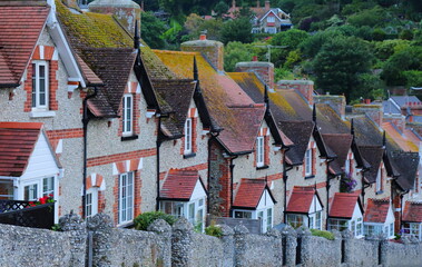 Row of terraced houses in coastal village of Beer, Devon