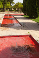 Valencia, Spain: Park of Turia,  red fountains compositions.