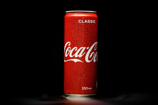 Cola cola drink can black background, water drops. MINSK, BELARUS, July 23, 2020