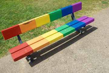 Bench painted with a rainbow