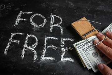 hand with money trapped. borrow money, credits, loans
