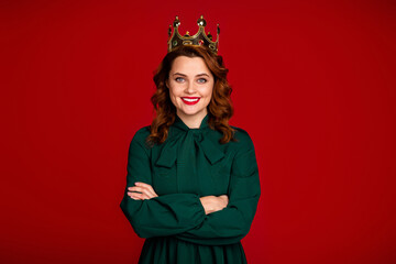Portrait of her she nice-looking attractive gorgeous cheerful wavy-haired girl wearing diadem folded arms isolated on bright vivid shine vibrant red maroon burgundy marsala color background