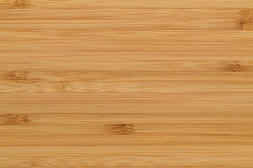 Smooth bamboo wood background board in a horizontal pattern.