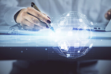 Social network theme hologram over hands taking notes background. Concept of global international people connect. Double exposure