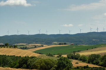 The valley of wind turbines in the Tuscan countryside Pisa
