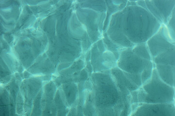 Alanya, TURKEY - August 10, 2013: Travel to Turkey. The waves of the Mediterranean Sea. Water surface.