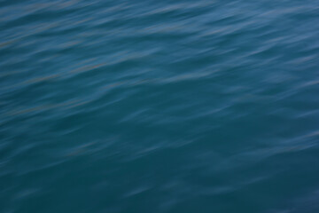 Alanya, TURKEY - August 10, 2013: Travel to Turkey. The waves of the Mediterranean Sea. Water surface.