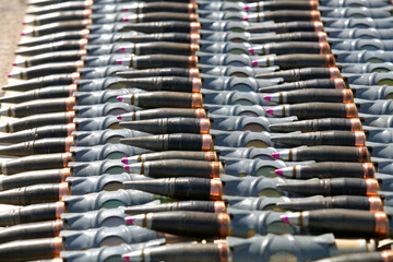 Patrons and ammunition close-up neatly and beautifully laid out, background,