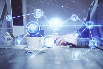 Social network theme hologram with businessman working on computer on background. Concept of world wide web. Multi exposure.