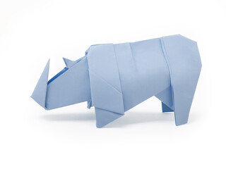 Origami cute rhinoceros on a white background