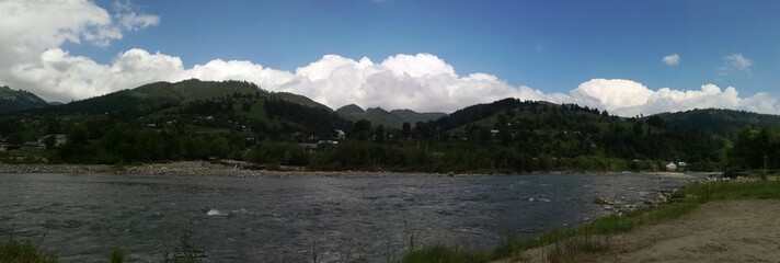 Fototapeta premium Carpathian mountains and mountain river on a summer day landscape panorama