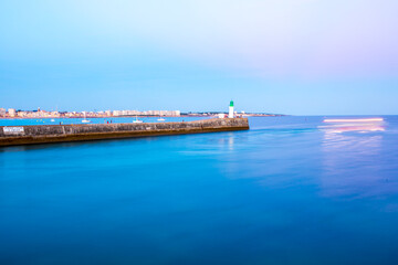 Entrance of Les Sables D'Olonne harbour taken from La Chaume, with it piers and lighthouse at...